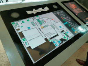 Photo of a multisensory navigation stand, featuring a tactile map 